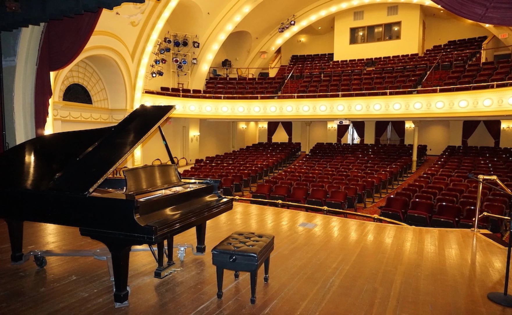 A piano on stage at the Cheboygan Opera House